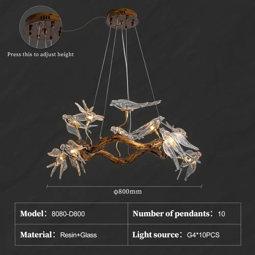 DecorBites™ luxury vintage glass bird chandelier with ten translucent glass bird pendants on a rustic resin branch illuminated by g4 led bulbs