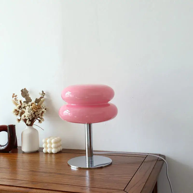 Pastel pink glossy glass decorbites™ macaron lamp with sleek chrome base by italian designer for table use