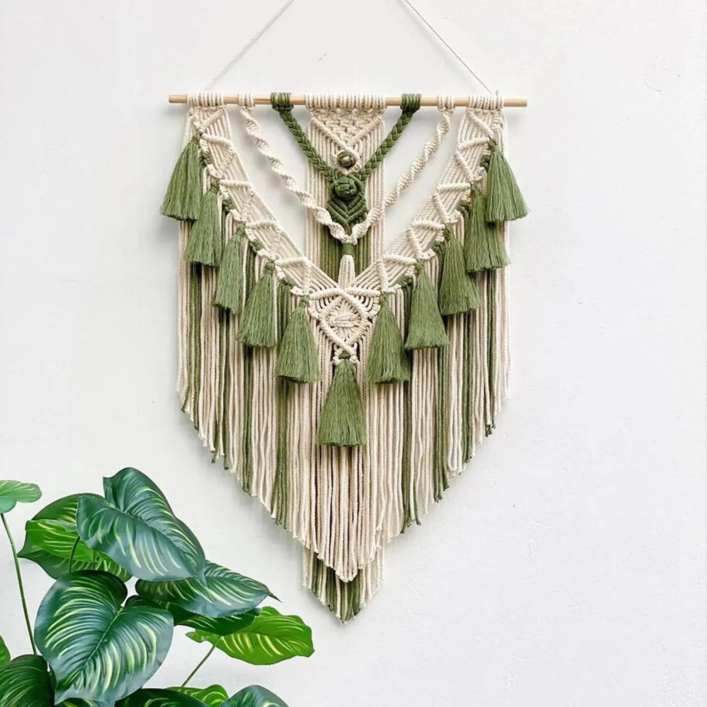 Beige and olive green macrame wall hanging with tassels on wooden dowel chic bohemian home decor tapestry