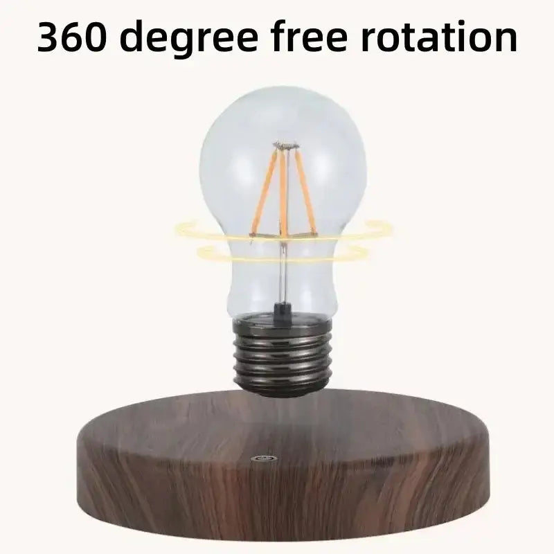 A clear glass edison-style bulb with visible filament levitating magnetically above a dark wood base levitation lamp