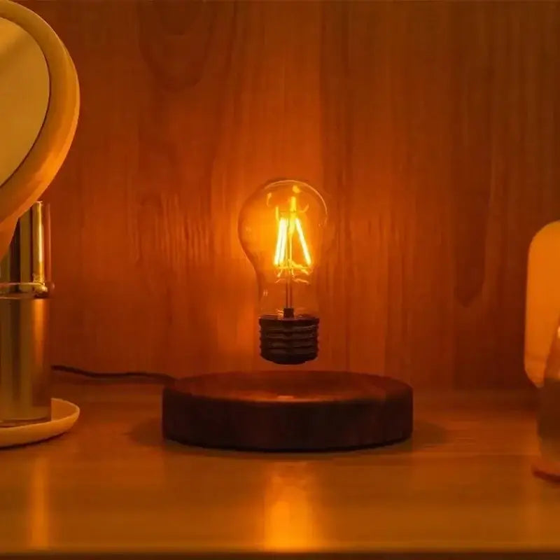 Decorbites™ magnetic levitation lamp with floating amber filament bulb and dark wooden base for home office decor