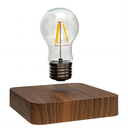 Decorbites™ magnetic levitation lamp with floating clear glass led bulb and warm yellow filament on dark wood base