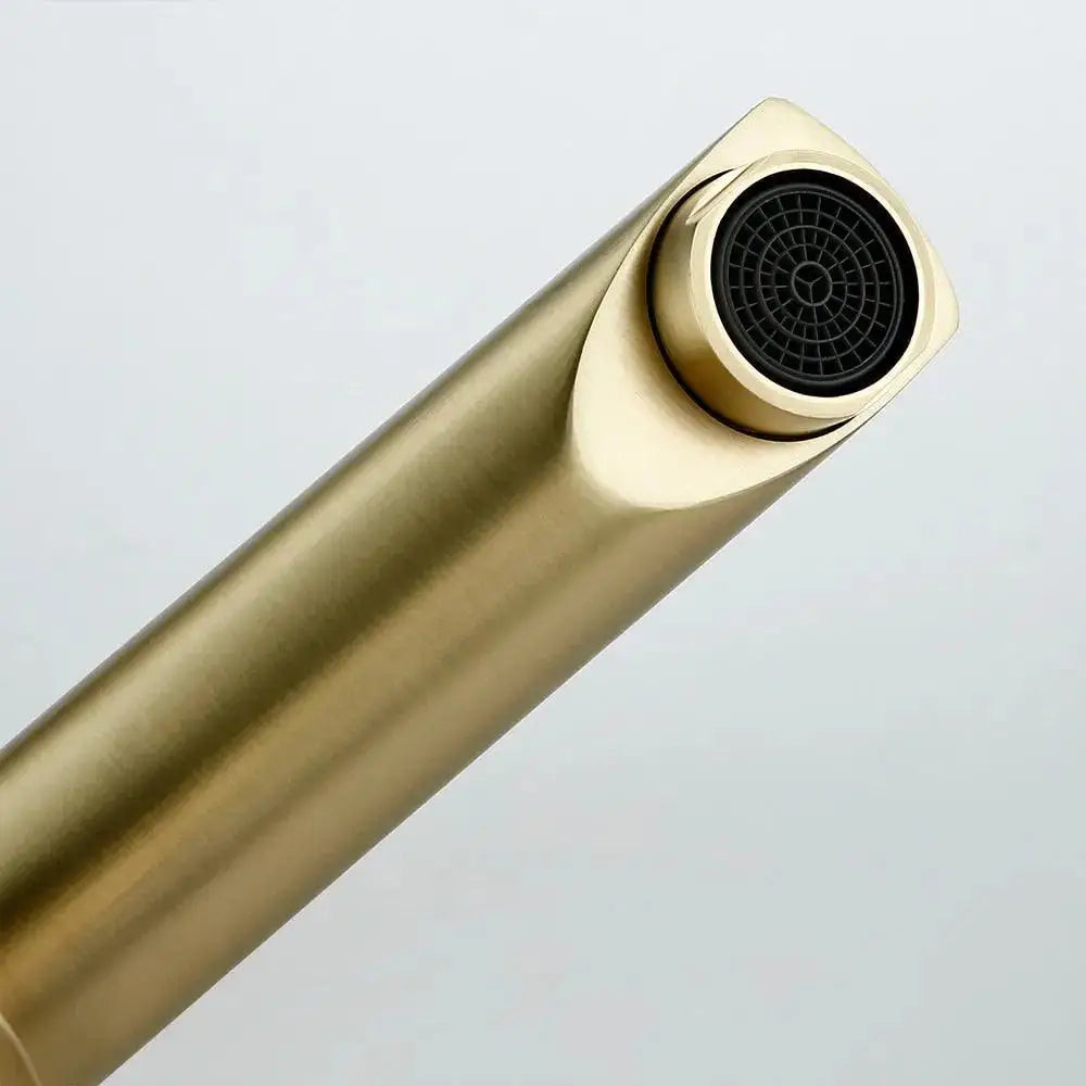 DecorBites™ Malena deck mounted bathroom faucet in brushed gold with sleek rectangular spout and black mesh filter