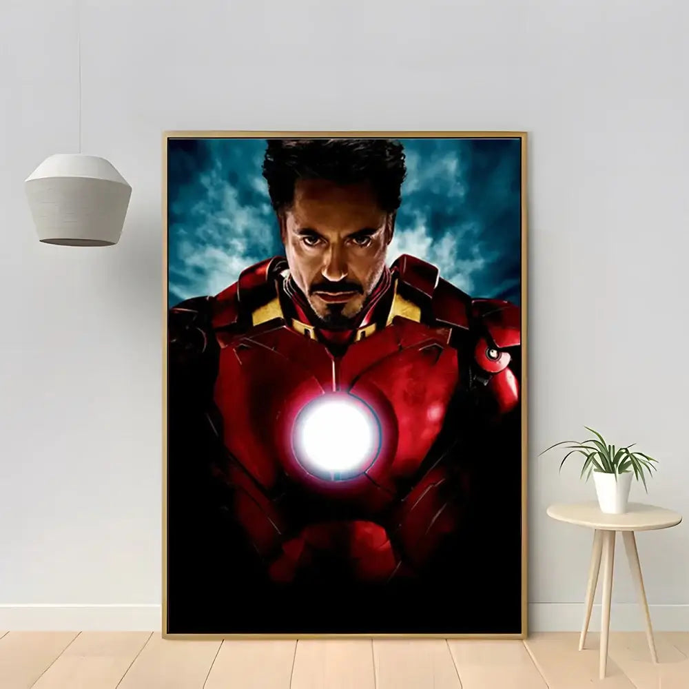 A framed marvel iron man canvas poster featuring tony stark in a red and gold suit with a glowing arc reactor for home decor