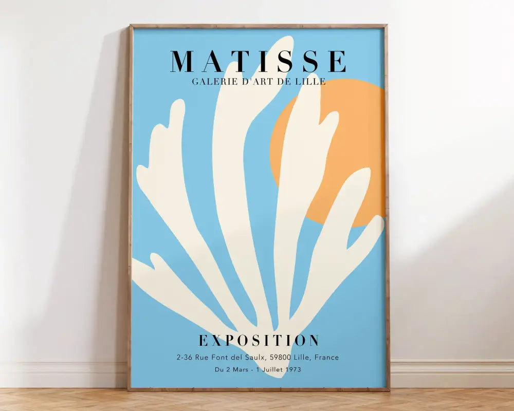 A framed decorbites™ matisse botanical flower poster with white coral on light blue and orange background with black text