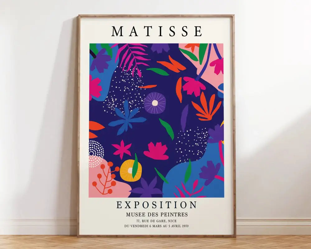A vibrant framed matisse botanical flower poster with bold pink orange blue and purple floral patterns on navy background