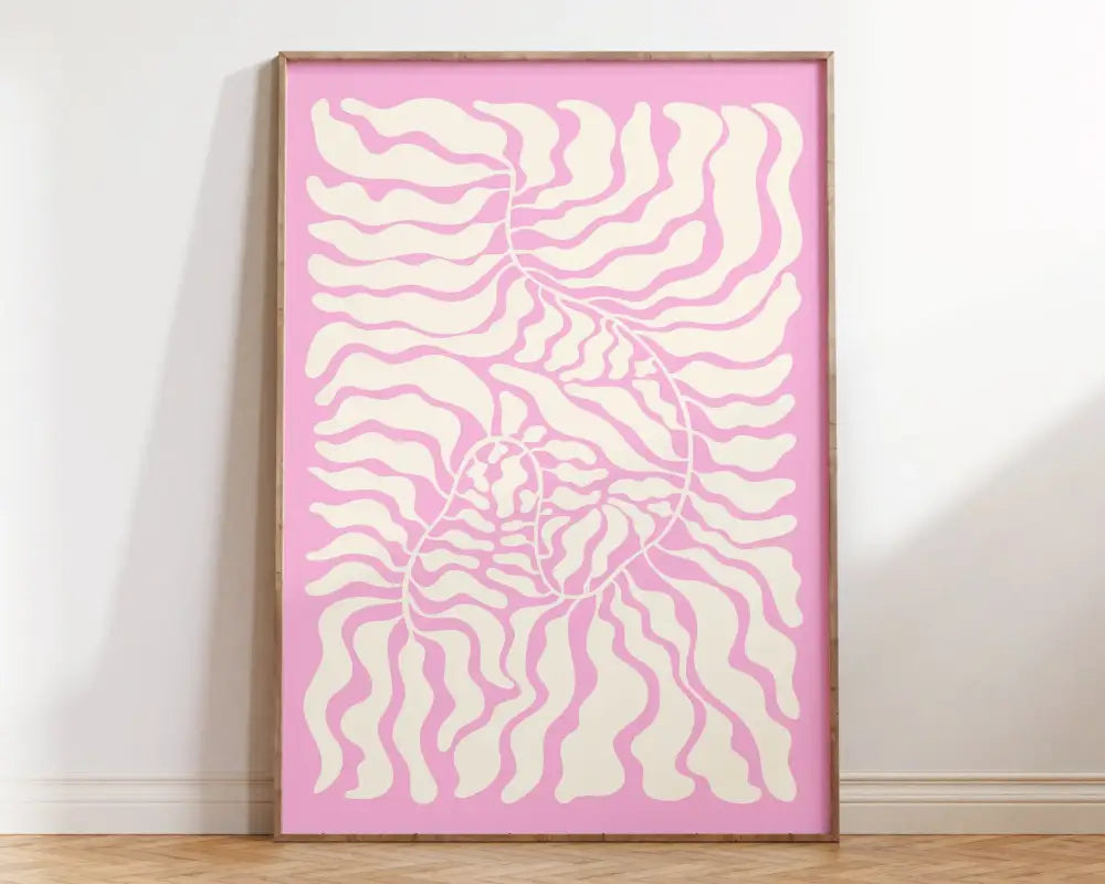 A framed DecorBites™ Matisse floral art poster with abstract flowers in cream wavy patterns on a soft pink background