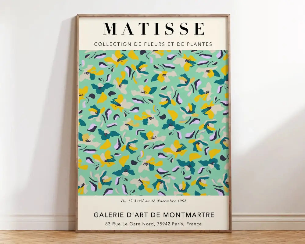 A framed decorbites™ matisse floral art poster featuring vibrant mint green yellow and purple botanical cut outs on a light background