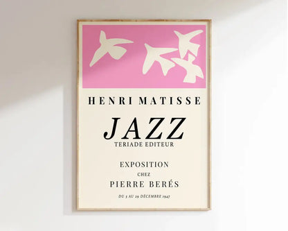 A framed matisse floral art print with pink birds and black text from the 1947 henri matisse jazz exhibition