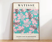 A framed matisse floral art print with turquoise background and pink polka dot flowers from decorbites collection