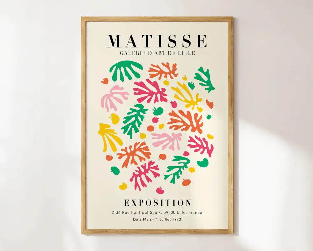 A framed decorbites™ matisse floral art print featuring vibrant coral-like shapes in pink green orange and yellow