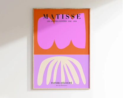 A framed DecorBites™ matisse floral art print featuring bold abstract cut-paper art in vibrant orange and lavender hues