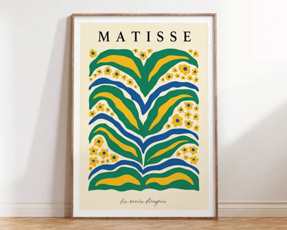 A framed matisse floral canvas print with bold green yellow and blue abstract floral patterns from DecorBites