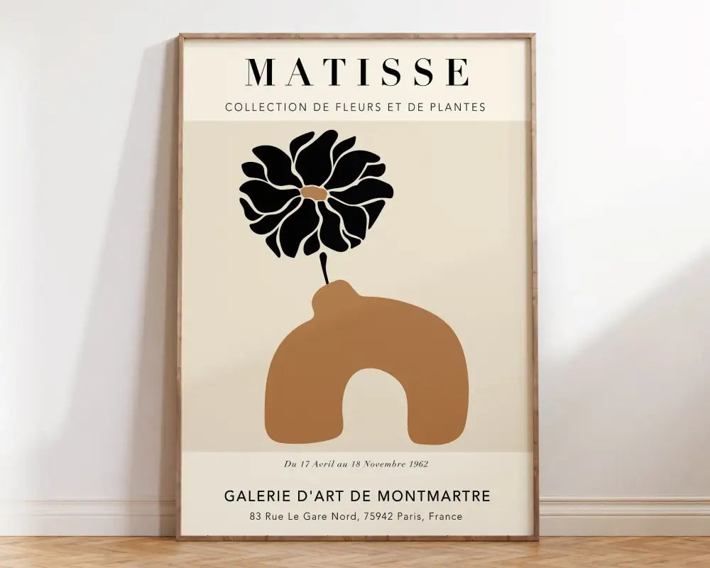 Beige-framed abstract flowers canvas featuring a black flower and ochre vase in matisse floral minimalist style decorbites