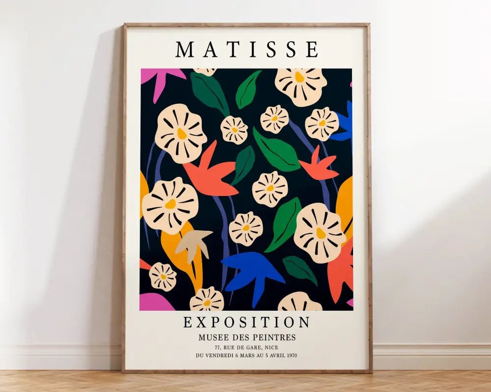 A framed decorbites matisse floral abstract flowers canvas with vibrant cream green orange blue and pink design on dark background