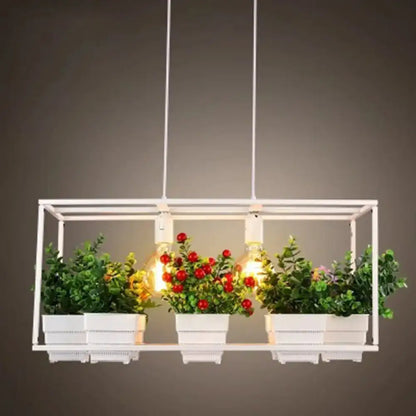 White metal 2-head rectangle pendant light fixture with three bulbs, integrated planters with artificial bonsai and red berries