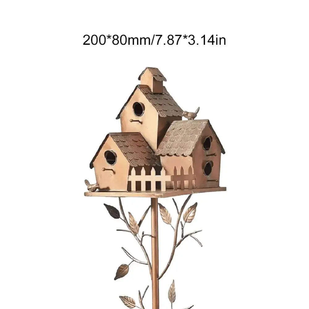 Copper-toned metal DecorBites™ birdhouse garden stakes with three compartments and shingled roofs on a branch stand