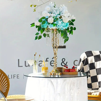 Elegant gold-toned metal flower vase chandelier centerpiece with cascading white and light blue silk flowers for weddings