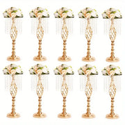 DecorBites metal flower vases in gold with intricate lattice design topped with white and peach roses for wedding centerpieces