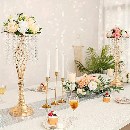 Gold-colored crystal-adorned tall metal flower vase from decorbites for wedding centerpieces with floral arrangement on top