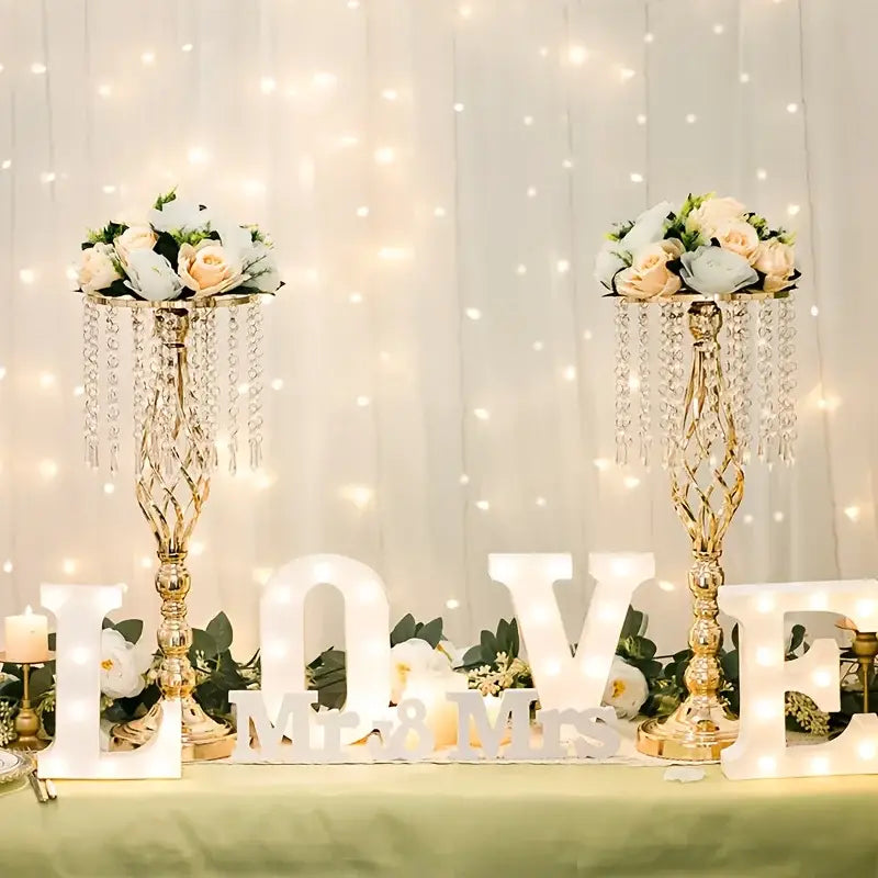 Gold crystal chandelier-style metal flower vases with cascading clear beads and floral arrangements for wedding centerpieces