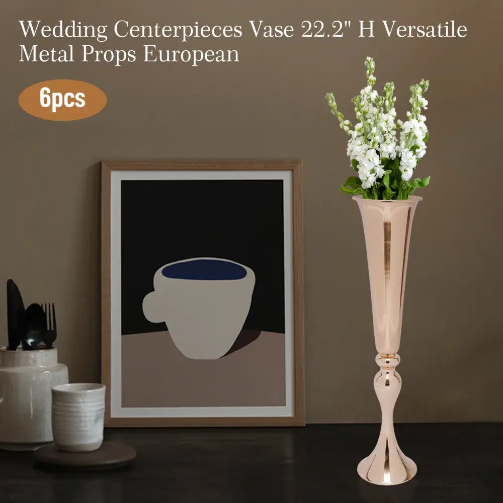 DecorBites metal golden flower stand is a tall slender rose gold metal candle holder with a flared top and decorative base