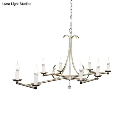 DecorBites metal island chandelier light with brushed nickel finish, eight traditional candle bulbs, and crystal droplet