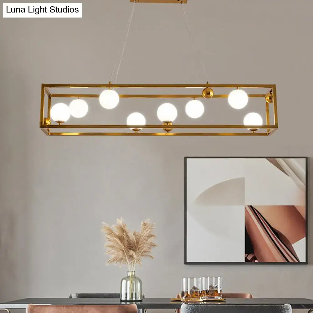 Decorbites metal pendant light with gold-toned frame and milk glass shade for industrial dining rooms