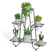 Decorbites metal plant stand is a black wrought iron 6 tier display rack with ornate curved legs holding green plants
