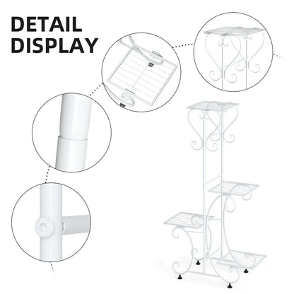White wrought iron metal plant stand with ornate scrollwork and four tiered shelves for displaying flower pots