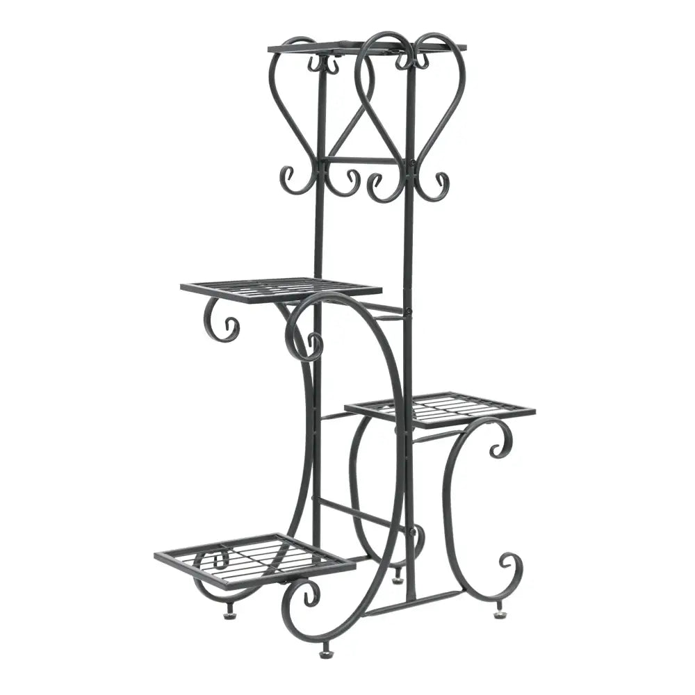 Black wrought iron metal plant stand with ornate scrollwork and three tiered shelves for 4 flower pots by DecorBites