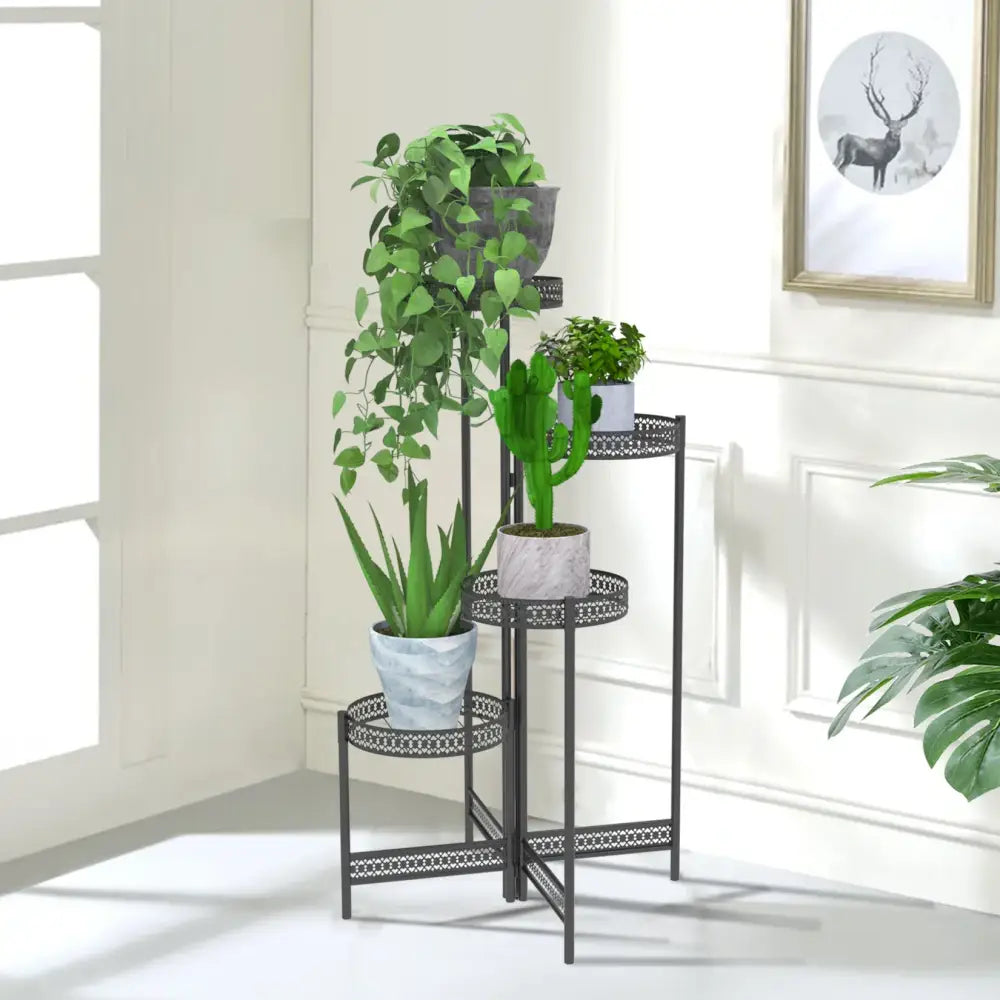 Black metal plant stand with decorative lattice design and three tiers for indoor and outdoor living room use