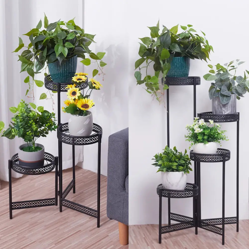 Black metal plant stand with ornate lattice design and three tiers for indoor and outdoor living room use