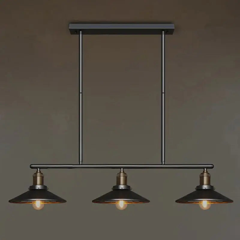 Decorbites metallic antique cone shade pendant lighting in black metal with brass accents and three exposed bulbs