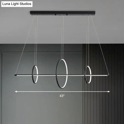 Modern black and white circular pendant light fixture with three illuminated rings and fixture width for 220v-240v use