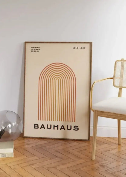 Beige framed bauhaus poster with warm orange geometric arch design mid century modern wall art by decorbites