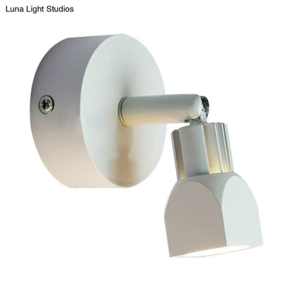 Contemporary style white wall lamp with matte circular base and adjustable arm for direct wired electric bedroom spotlight