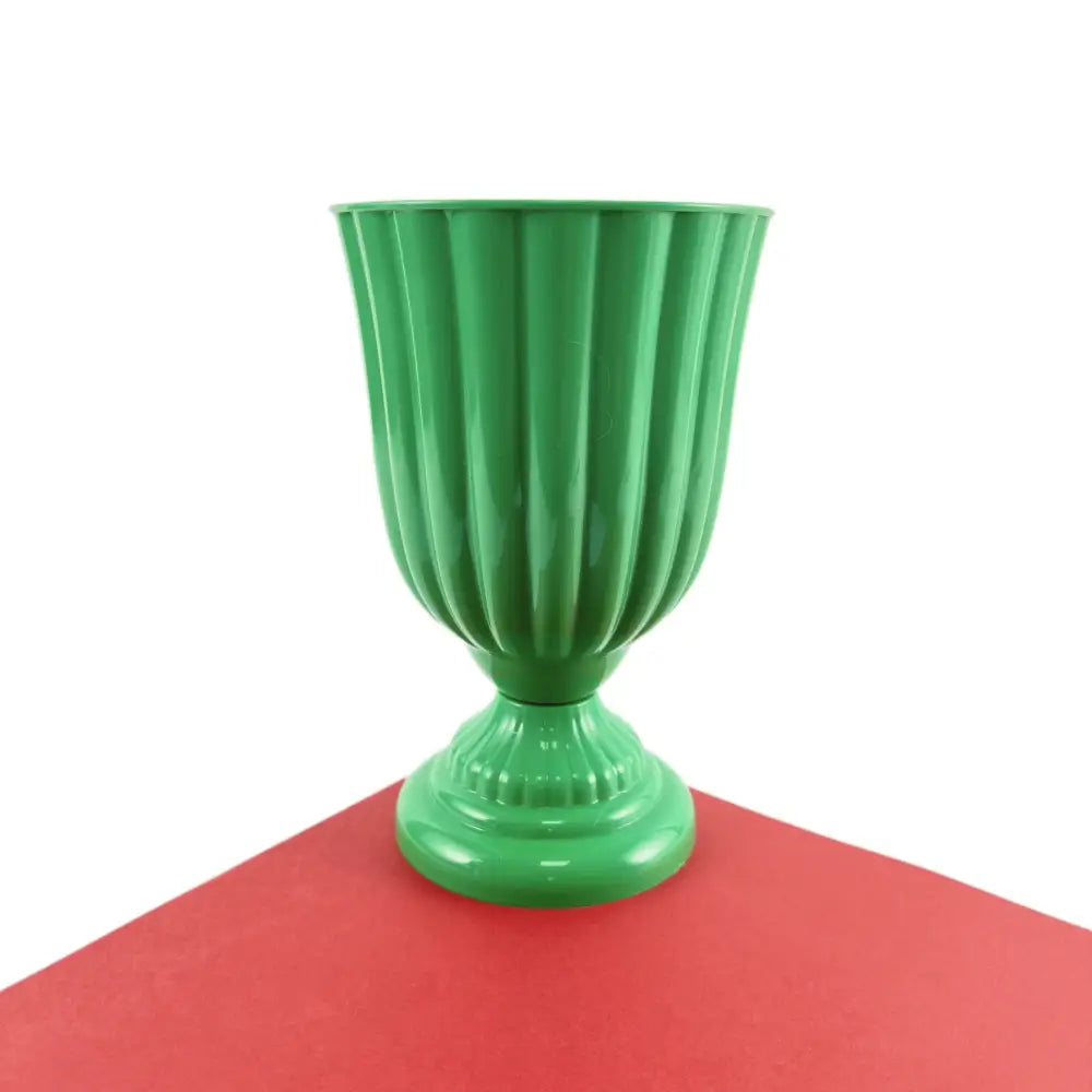 DecorBites mini flower arrangement vase is a glossy green fluted ceramic urn with a decorative ridged base for home decor