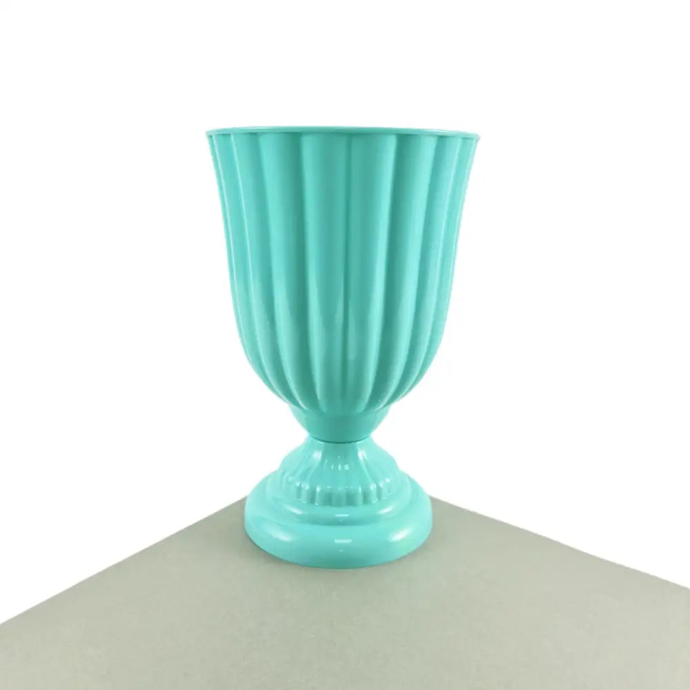 Turquoise plastic decorbites™ mini flower arrangement vase with vertical fluted ridges and decorative pedestal base
