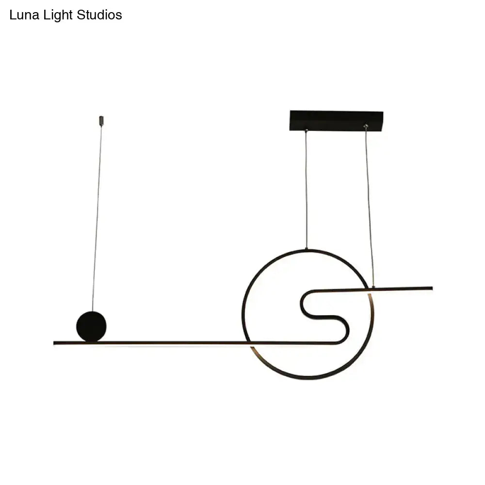 Black minimalist acrylic island light with warm white light featuring geometric sun and cloud design in black white gold