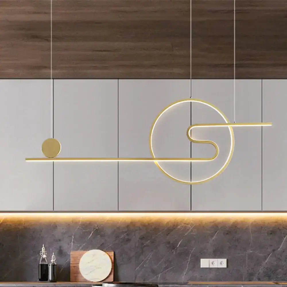 Modern gold-toned decorbites™ acrylic linear led island light with warm white light in black white gold finish and sun cloud design