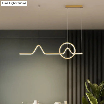 Modern gold-toned minimalist aluminum led dining room pendant light with mountain and sun design by DecorBites™