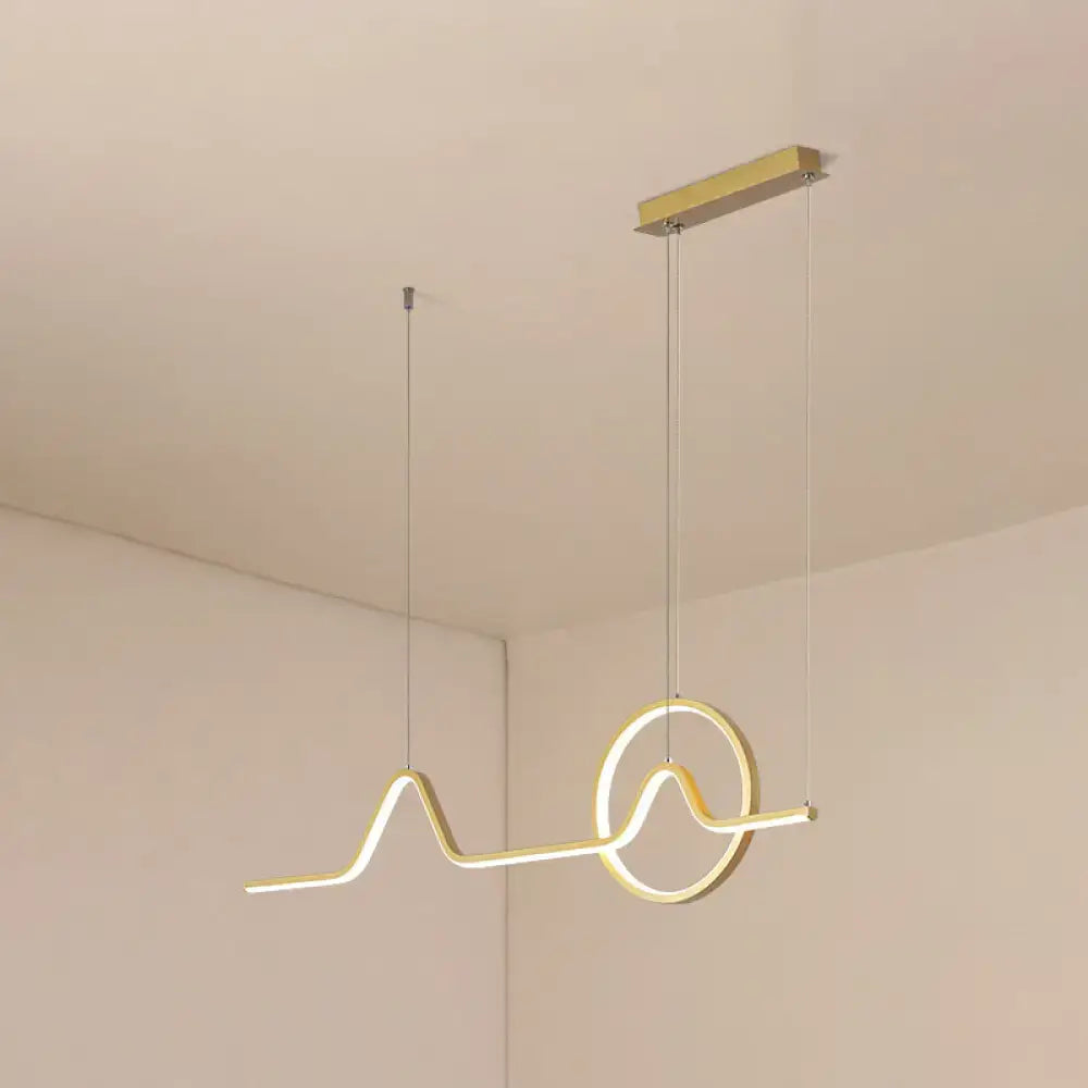 Modern gold-toned aluminum led dining room pendant lamp with abstract wave and circle motif by decorbites