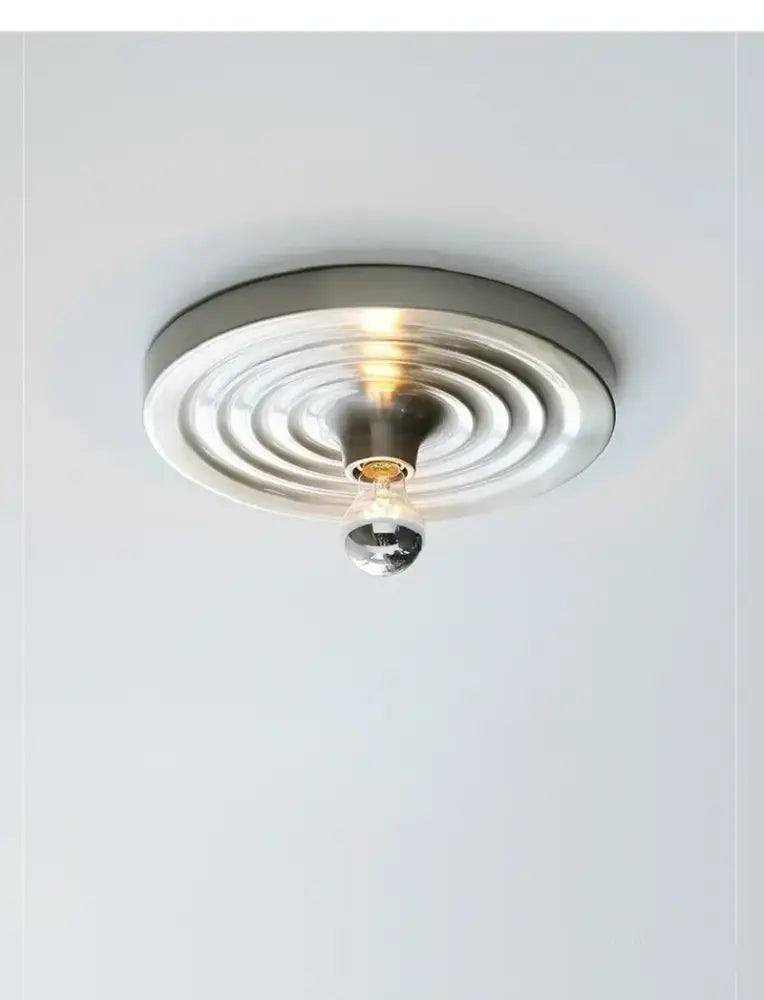 Modern brushed nickel decorbites bauhaus lamp with concentric rings and clear glass globe ceiling light fixture