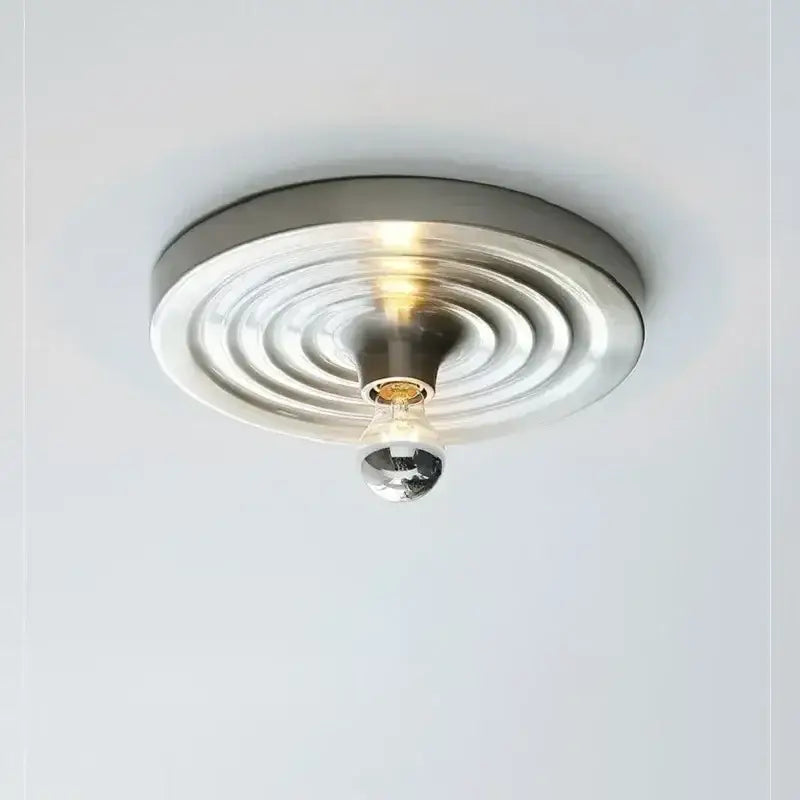 Modern brushed nickel decorbites bauhaus lamp with concentric circular rings and clear glass globe bulb ceiling light
