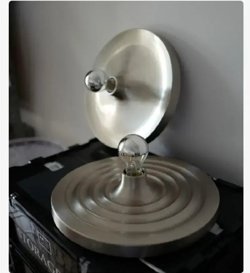 Silver-toned circular lamp base with concentric ridges and central bulb holder for decorbites bauhaus lamp