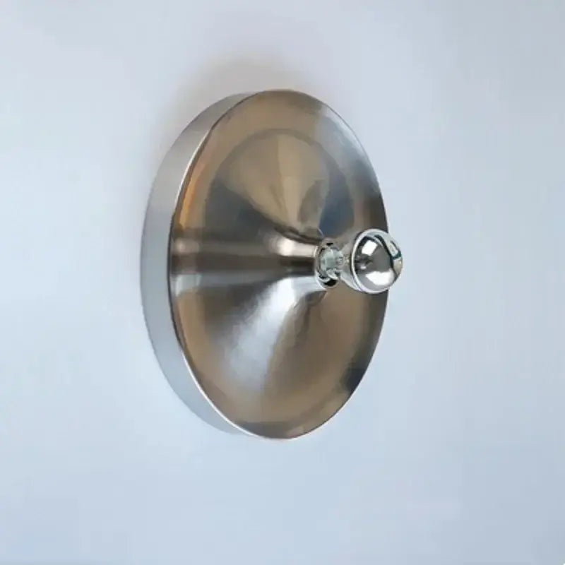 A sleek circular stainless steel wall-mounted hook with polished finish for decorbites bauhaus lamp accessories