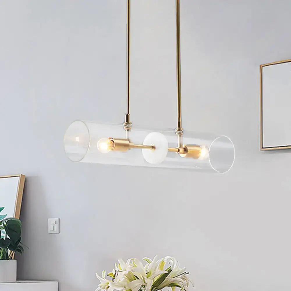 DecorBites minimalist brass finish island pendant suspended lighting fixture with clear glass tubes and exposed bulbs