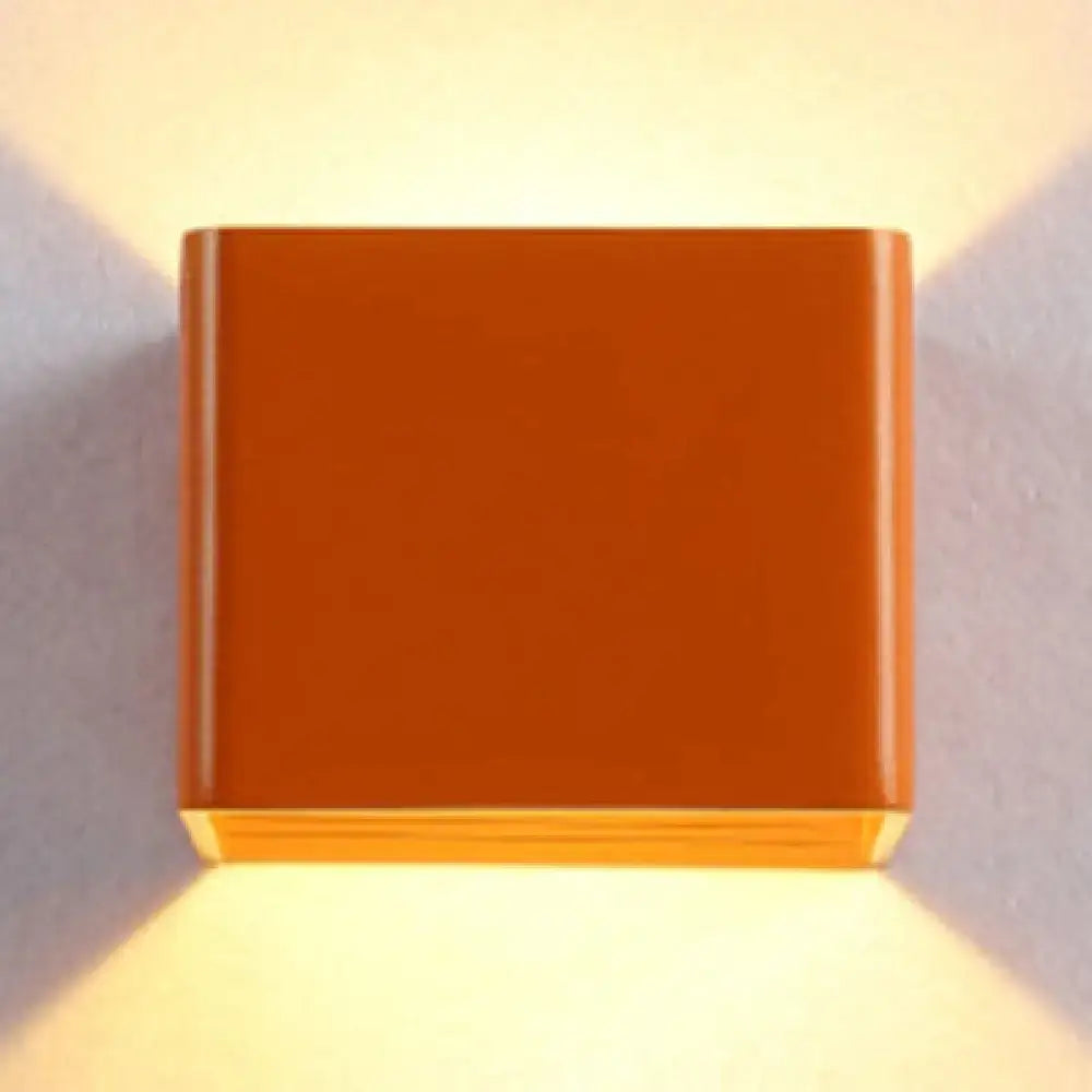Orange square sconce light with sleek modern design and glossy finish for decorbites minimalist cube shade living room decor