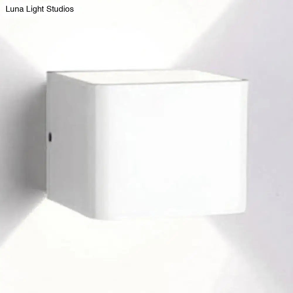 White cube-shaped sconce light with decorbites minimalist cube shade in black and white for modern living room decor